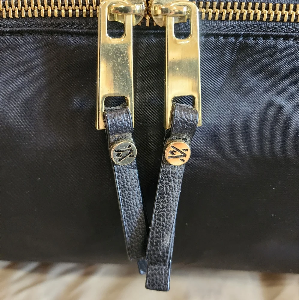 Travanti Black Large Laptop Bag with Gold Accents and Red Interior